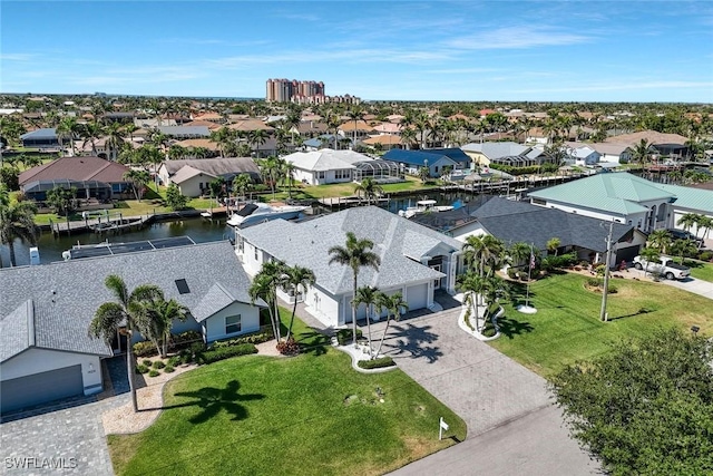 1428 SW 52nd Ln, Cape Coral, FL 33914 - aerial perspective of suburban area with a nearby body of water