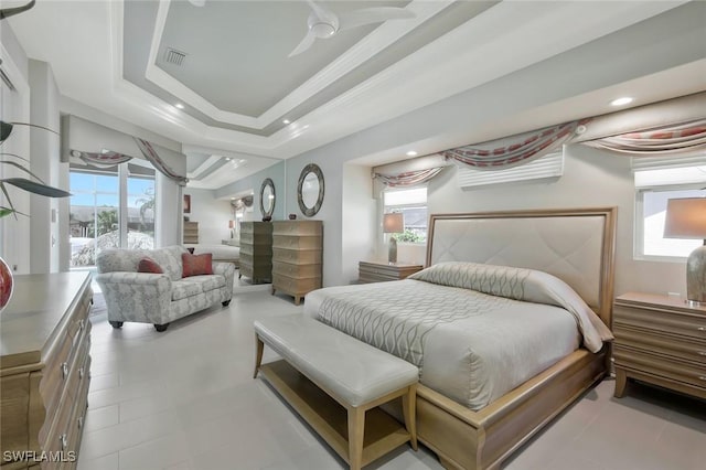 1428 SW 52nd Ln, Cape Coral, FL 33914 - bedroom featuring multiple windows and a tray ceiling