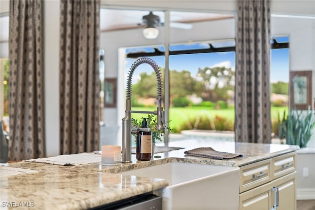 11730 Rosemount Dr, Fort Myers, FL 33913 - kitchen with a sink and light stone countertops