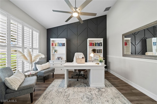 11730 Rosemount Dr, Fort Myers, FL 33913 - office space with an accent wall, vaulted ceiling, a ceiling fan, dark wood-style flooring, and baseboards