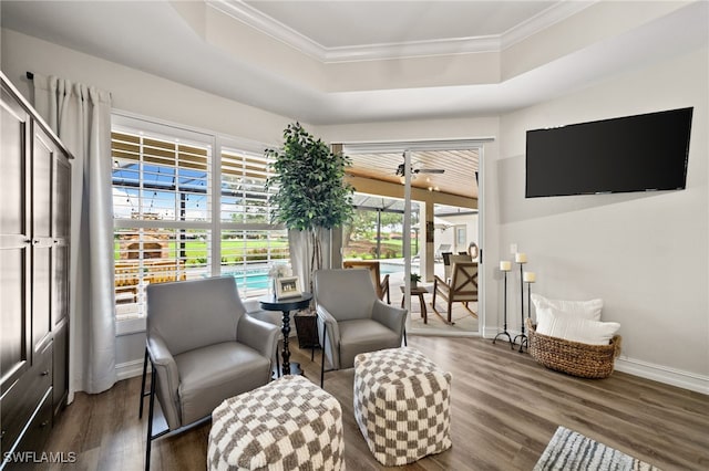 11730 Rosemount Dr, Fort Myers, FL 33913 - sitting room with a raised ceiling, wood finished floors, ornamental molding, baseboards, and a ceiling fan