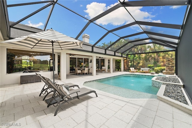 11730 Rosemount Dr, Fort Myers, FL 33913 - swimming pool featuring a patio area, a ceiling fan, glass enclosure, and outdoor dining area