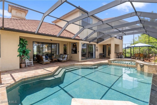 2227 SW 54th Ln, Cape Coral, FL 33914 - view of pool with outdoor lounge area, a patio, a pool with connected hot tub, ceiling fan, and outdoor dining area
