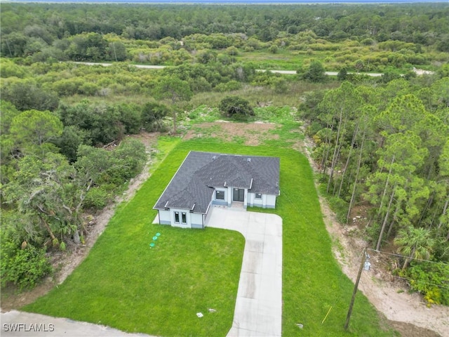 1432 Euclid Ave, Lehigh Acres, FL 33972 - aerial view of property and surrounding area with a forest