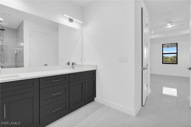 1432 Euclid Ave, Lehigh Acres, FL 33972 - full bathroom featuring double vanity, a stall shower, and tile patterned floors