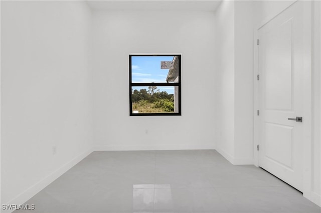 1432 Euclid Ave, Lehigh Acres, FL 33972 - spare room featuring baseboards