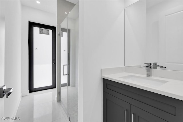 1432 Euclid Ave, Lehigh Acres, FL 33972 - bathroom with vanity, tile patterned flooring, and recessed lighting
