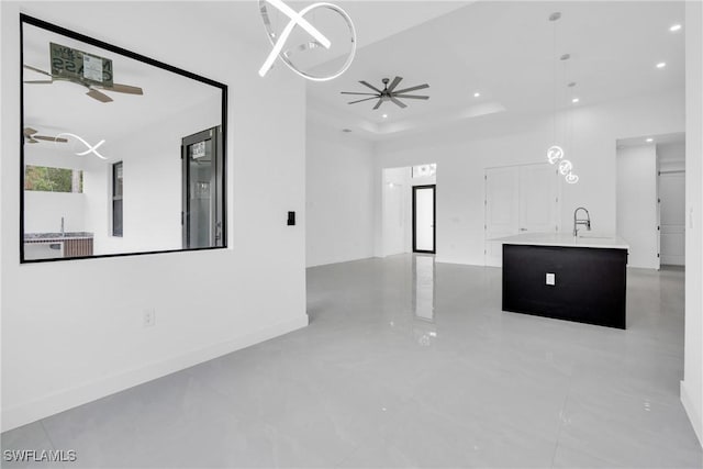 1432 Euclid Ave, Lehigh Acres, FL 33972 - unfurnished living room with recessed lighting, ceiling fan, and a raised ceiling