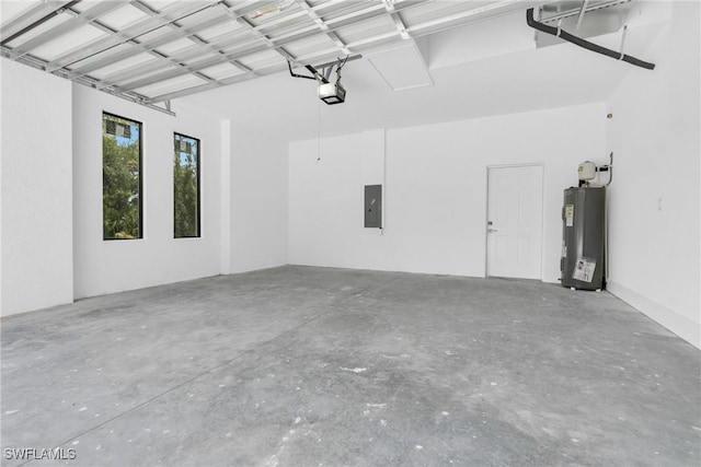 1432 Euclid Ave, Lehigh Acres, FL 33972 - garage with water heater, electric panel, and a garage door opener