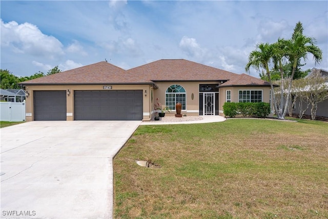 single story home featuring stucco siding, an attached garage, and driveway