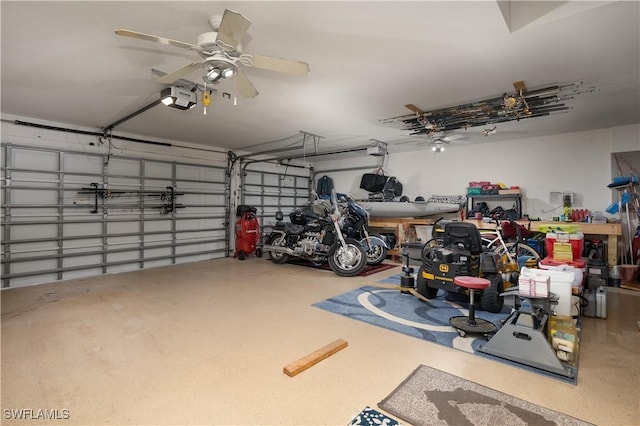 garage with a garage door opener and a ceiling fan