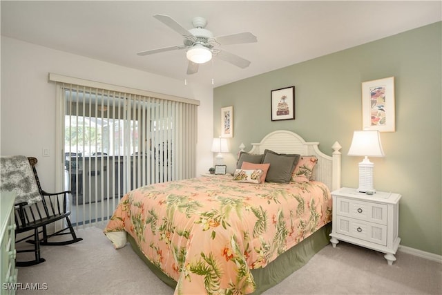 bedroom with carpet flooring, ceiling fan, access to exterior, and baseboards