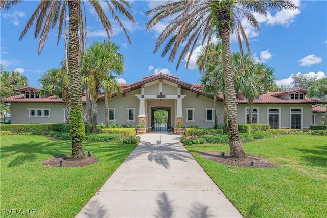 10626 Essex Square Blvd, Fort Myers, FL 33913 - view of front of house featuring stucco siding and a front yard