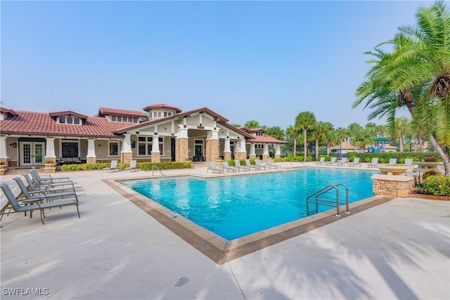 10626 Essex Square Blvd, Fort Myers, FL 33913 - community pool featuring french doors and a patio area