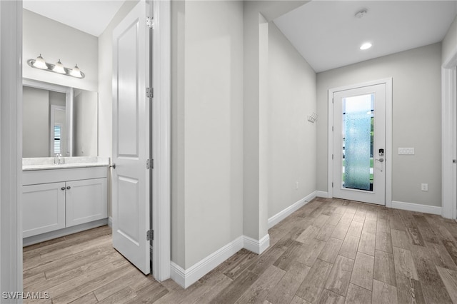 10626 Essex Square Blvd, Fort Myers, FL 33913 - entryway with light wood-style floors, baseboards, and recessed lighting
