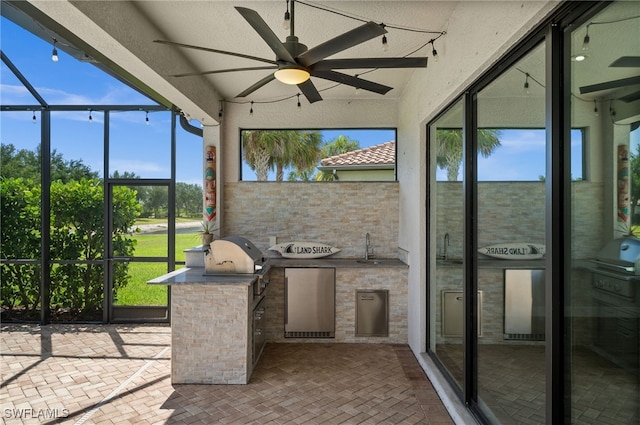 10626 Essex Square Blvd, Fort Myers, FL 33913 - unfurnished sunroom with an outdoor kitchen, a ceiling fan, and plenty of natural light