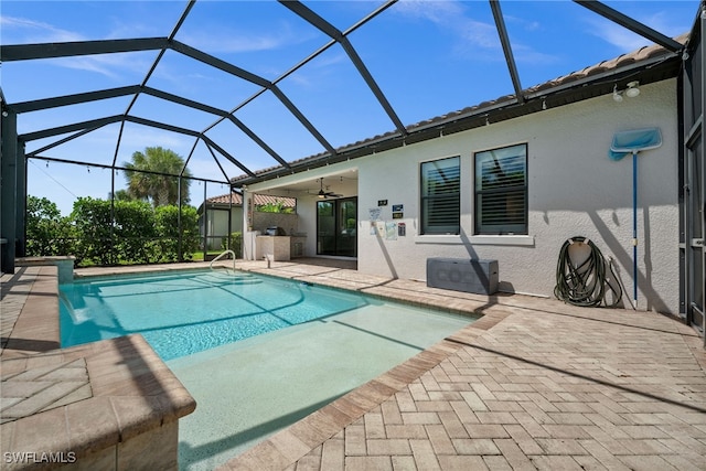 10626 Essex Square Blvd, Fort Myers, FL 33913 - outdoor pool with a patio area, a ceiling fan, and glass enclosure