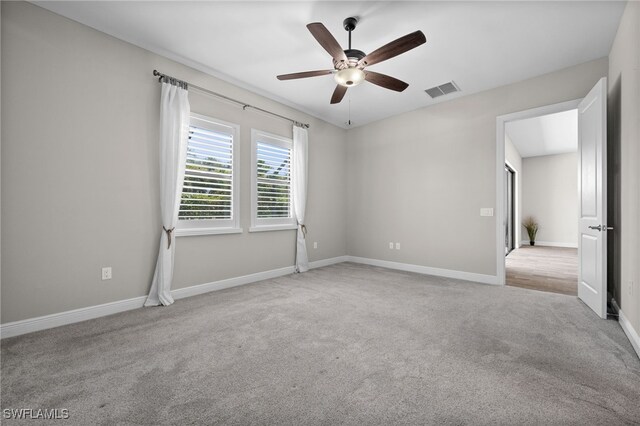 10626 Essex Square Blvd, Fort Myers, FL 33913 - carpeted spare room with a ceiling fan and baseboards