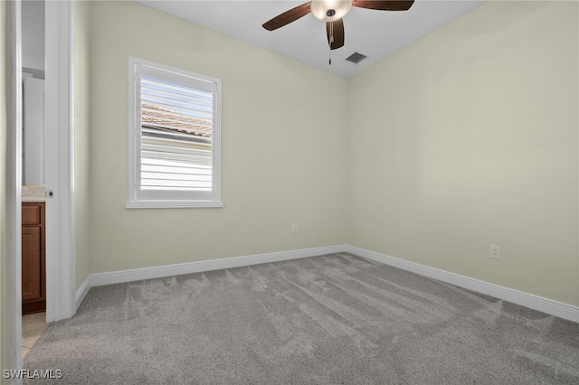 10626 Essex Square Blvd, Fort Myers, FL 33913 - spare room featuring ceiling fan, light carpet, and baseboards