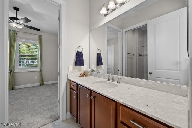 10626 Essex Square Blvd, Fort Myers, FL 33913 - bathroom featuring vanity, ceiling fan, and baseboards