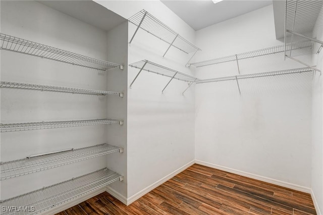 1976 San Marco Rd, Marco Island, FL 34145 - spacious closet featuring wood finished floors