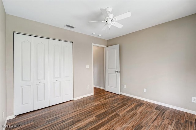 1976 San Marco Rd, Marco Island, FL 34145 - unfurnished bedroom featuring wood finished floors, a closet, and a ceiling fan