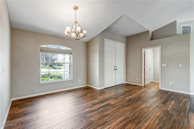 1976 San Marco Rd, Marco Island, FL 34145 - empty room featuring a chandelier and dark wood finished floors