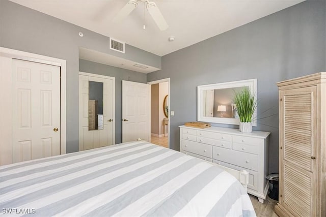 bedroom featuring a ceiling fan and light wood-style flooring