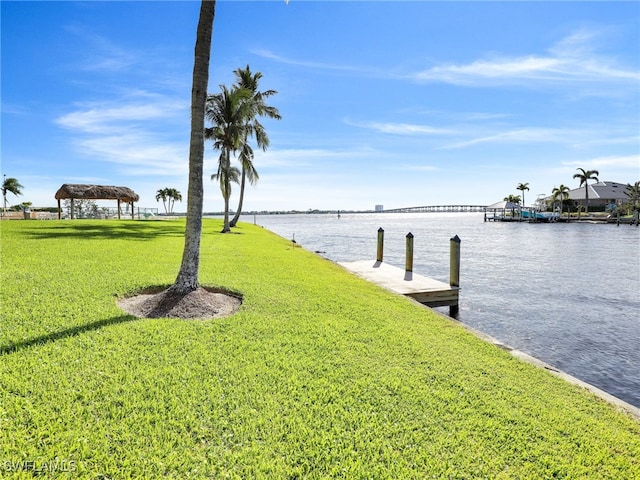 4280 SE 20th Pl Unit 207, Cape Coral, FL 33904 - dock with a water view, a yard, and a gazebo
