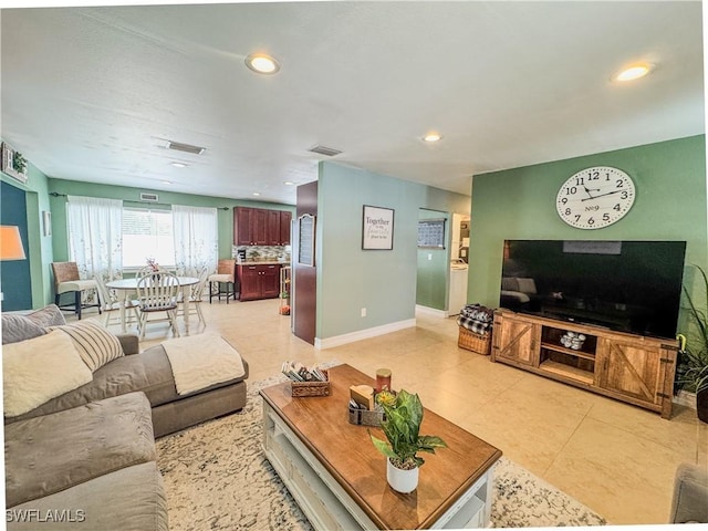4002 Cascade Ln, Labelle, FL 33935 - living room with baseboards, recessed lighting, and light tile patterned flooring