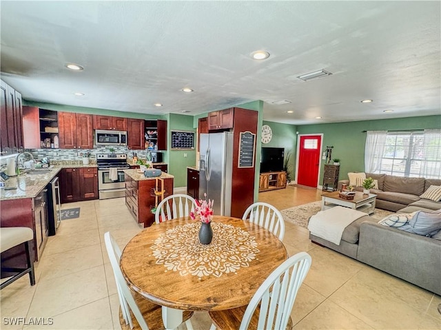 4002 Cascade Ln, Labelle, FL 33935 - dining room featuring light tile patterned flooring and recessed lighting