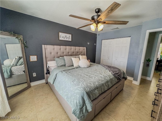 4002 Cascade Ln, Labelle, FL 33935 - bedroom with light tile patterned floors, baseboards, a closet, and ceiling fan