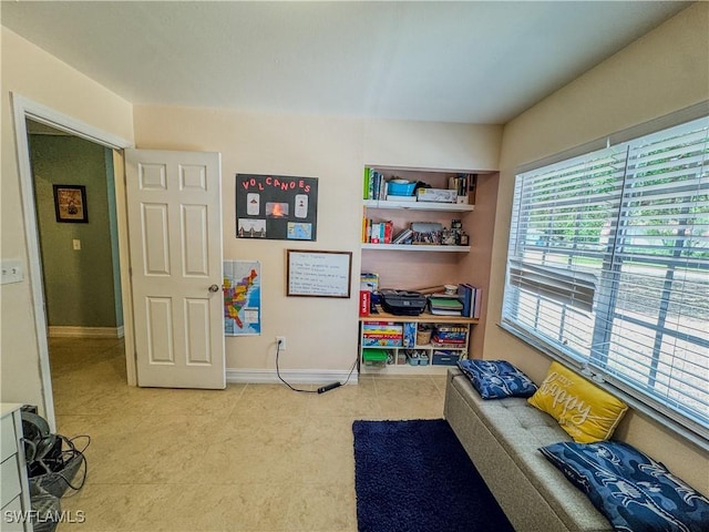 4002 Cascade Ln, Labelle, FL 33935 - playroom with baseboards and tile patterned flooring