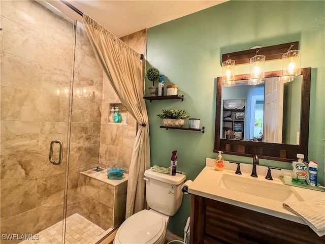 4002 Cascade Ln, Labelle, FL 33935 - bathroom featuring a stall shower, toilet, and vanity