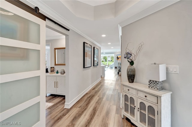 3580 Windjammer Cir Unit 1603, Naples, FL 34112 - hall with light wood finished floors, recessed lighting, a barn door, ornamental molding, and baseboards