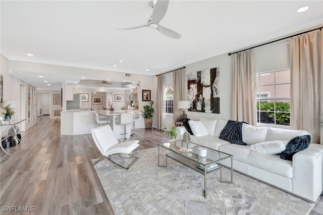 3580 Windjammer Cir Unit 1603, Naples, FL 34112 - living area with a ceiling fan, ornamental molding, light wood-type flooring, and recessed lighting