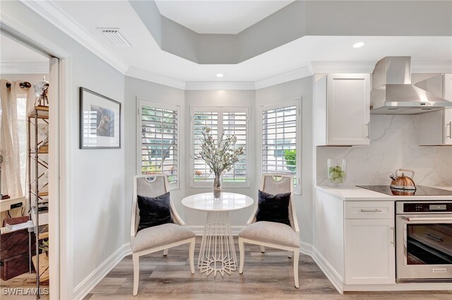 3580 Windjammer Cir Unit 1603, Naples, FL 34112 - dining room with light wood-style floors, baseboards, recessed lighting, and ornamental molding