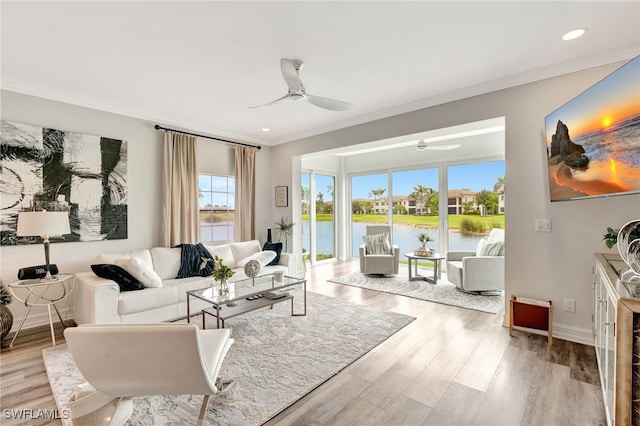 3580 Windjammer Cir Unit 1603, Naples, FL 34112 - living area with a ceiling fan, crown molding, wood finished floors, recessed lighting, and baseboards