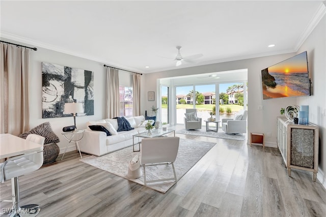 3580 Windjammer Cir Unit 1603, Naples, FL 34112 - living room featuring crown molding, wood finished floors, ceiling fan, baseboards, and recessed lighting