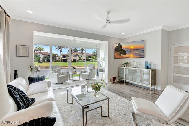 3580 Windjammer Cir Unit 1603, Naples, FL 34112 - living area featuring a ceiling fan, wood finished floors, ornamental molding, recessed lighting, and baseboards