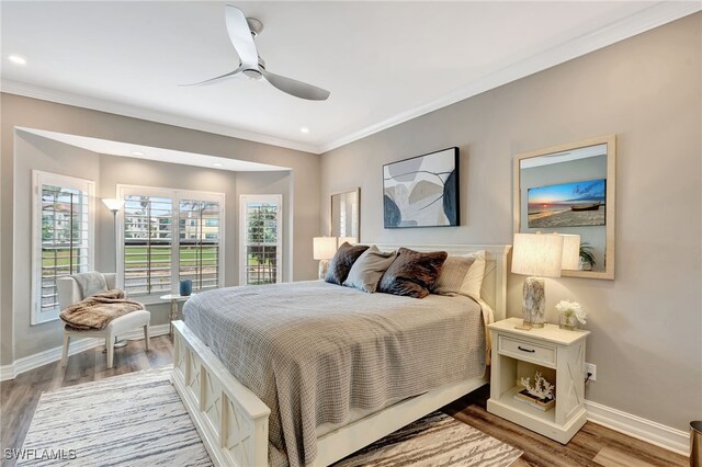 3580 Windjammer Cir Unit 1603, Naples, FL 34112 - bedroom with crown molding, baseboards, wood finished floors, a ceiling fan, and recessed lighting