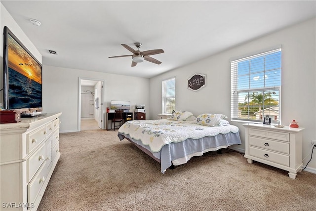 8118 Gopher Tortoise Trl, Lehigh Acres, FL 33972 - bedroom featuring light carpet, baseboards, and ceiling fan