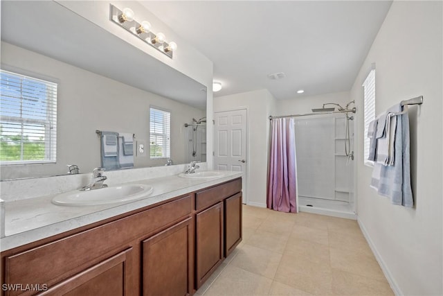 8118 Gopher Tortoise Trl, Lehigh Acres, FL 33972 - full bathroom featuring a shower stall, tile patterned flooring, double vanity, and baseboards