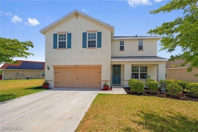 8118 Gopher Tortoise Trl, Lehigh Acres, FL 33972 - view of front of home with stucco siding, driveway, a front lawn, a garage, and cooling unit