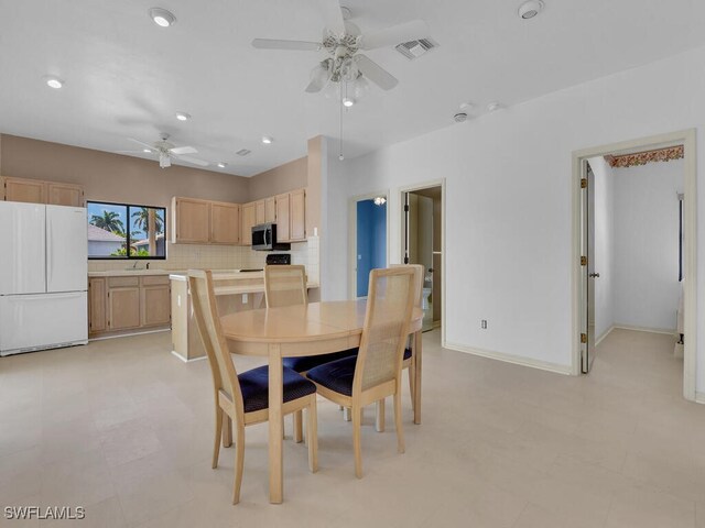 dining room with ceiling fan, recessed lighting, and baseboards