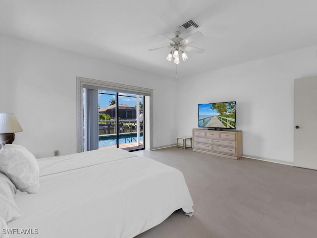 bedroom with a ceiling fan and baseboards