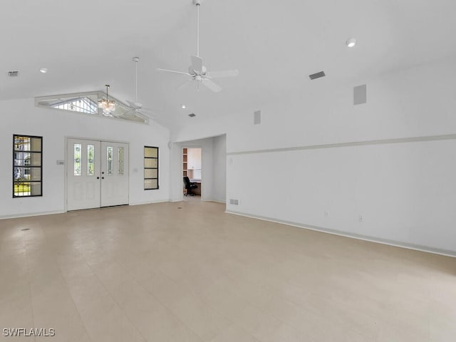 unfurnished living room with a ceiling fan, baseboards, high vaulted ceiling, and recessed lighting