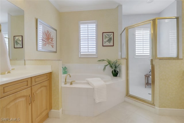 bathroom with a garden tub, plenty of natural light, vanity, and a shower stall