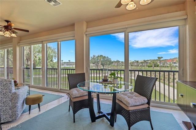 sunroom featuring tile patterned floors