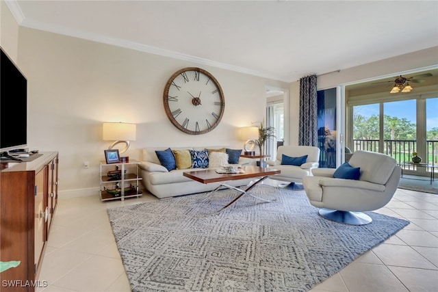 living area with light tile patterned floors, ornamental molding, and baseboards